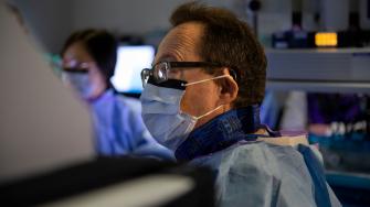 A GI surgeon performing surgery